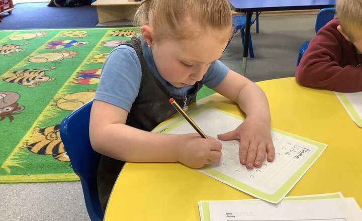 Image of Working hard on our handwriting.