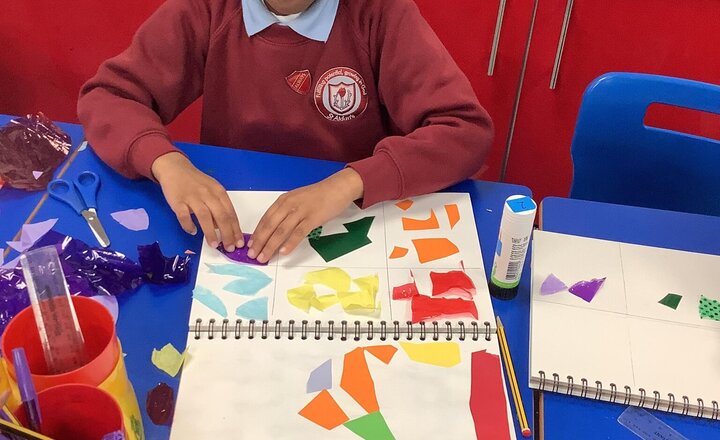 Image of Today in Art we responded to Henri Matisse ‘The Snail’ - we used the primary and secondary colours to arrange different materials in different patterns.  What a great week we have had so far!