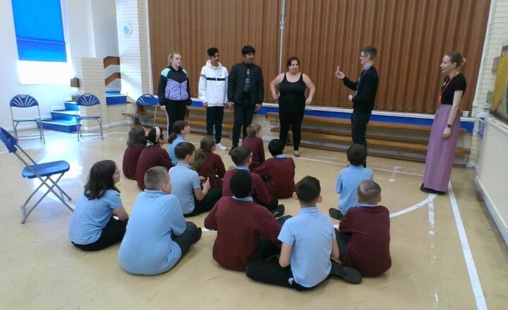 Image of This morning we had a visit from the people from Deaf Village as part of Deaf Awareness week. We thoroughly enjoyed it and learnt some sign language. Ask us to sign our name.