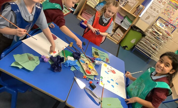 Image of In Art, we were printing with different objects and mixing primary colours.