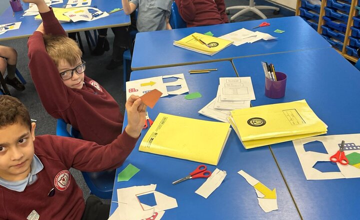 Image of Turning shapes through angles in maths today. Ask us about them when we get home.