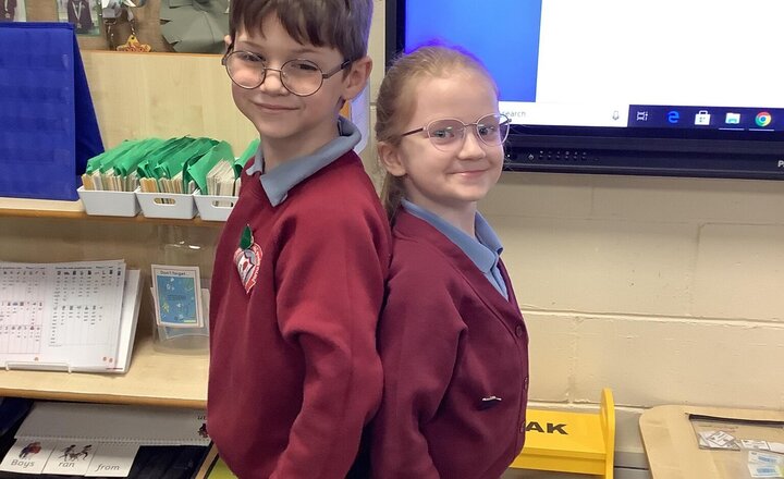 Image of Today in Maths, we have been looking at length and height. We have been finding objects around the classroom and comparing them, using the words taller, shorter, longer, and smaller. We even stood next to our friends to compare heights!