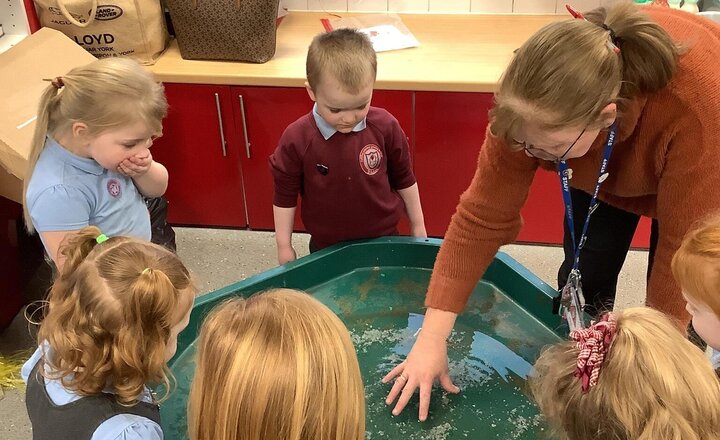 Image of Germs! Having noticed a number of children putting their fingers in their mouth all the time, we decided to explore a germs journey.  Mrs Holden led a mini experiment to show them how germs can be transported and how we can get rid of them.