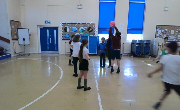 Image of We are continuing to develop our throwing, passing and catching skills in the PE lesson this morning.