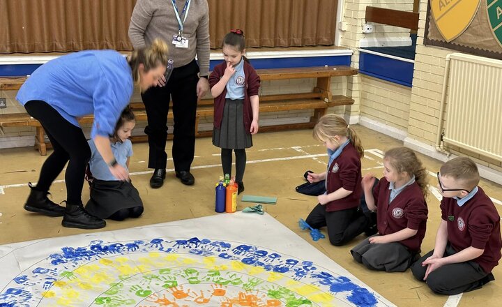 Image of As part of children’s mental health week we made a rainbow with Place2be to show how we are all connected together.